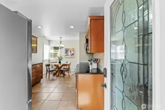 Updated kitchen with ceramic tile floors and dining room.