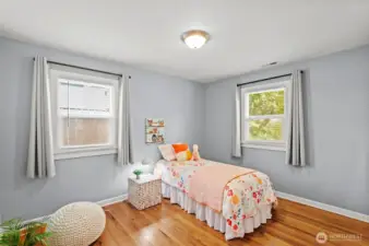 Bedroom with view of the backyard and has a walk-in closet!