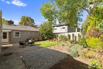 Easy to maintain landscaping, lots of space to garden, and a shed too!
