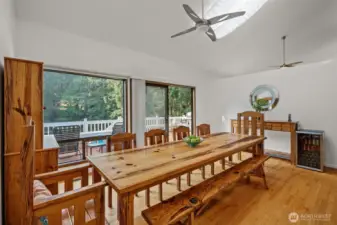 Skylights above dining space and ceiling fan.