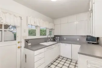 Clean kitchen with easy access to large covered deck.