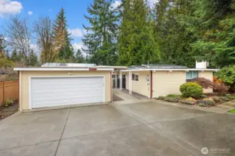 Welcome In and Stay Forever! You are less than 2 miles to the Microsoft Main Campus, 2 Light Rail Stations and Crossroads Shopping Center. The detached garage has Tesla chargers and 40A near driveway. There is embedded lighting in both driveway and walkway.