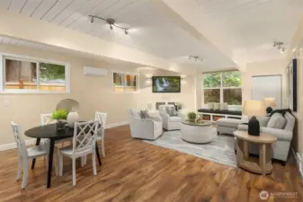 There is a hidden entertainment center with built in speakers below the flat screen tv. Note the mini-split installed for localized heating and cooling.