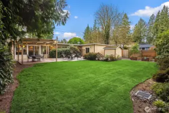 Fully fenced backyard for your four legged furry friends. Raised beds to make the gardener smile!