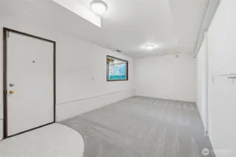 Additional downstairs room with direct access to the garage for added convenience.