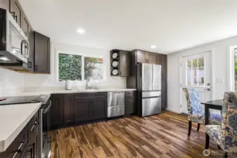 Beautifully updated kitchen with new cabinets, countertops and appliances.