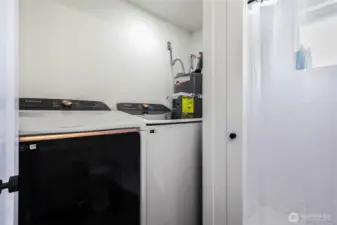 Laundry in the primary bath.