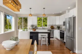Large kitchen with S/S appliances.