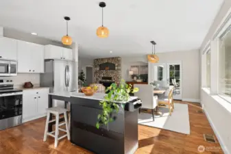 Open kitchen to den and view deck.