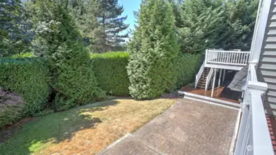 Step downstairs from the deck to a perfect sized yard and impressive patio for more entertaining options.