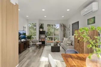 Enjoy a cozy evening in this inviting living space; the wooden accent wall adds a warm, natural touch to the contemporary design.