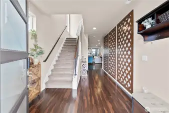 entry with custom art on wall
