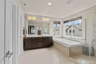 relax in the primary bathroom tub