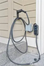 Electric charging station in the front of home plus 2nd one in garage