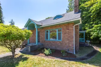 Classic architectural details, original brickwork, and vintage charm shine throughout. Newer roof!