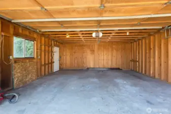 Plenty of room for two cars and possibly a workbench and cabinets in the garage.