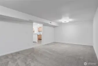 The highlight of the lower level is the extra-large family room, perfect for entertaining or relaxing—plus two bedrooms, a full kitchen, storage, bathroom and private access for guests or tenants