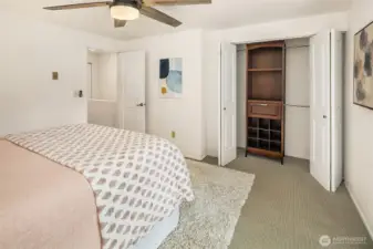 Custom shelving inserts in both bedroom closets.