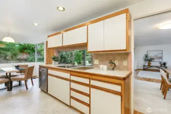 The spacious kitchen features plenty of counter and cupboard space.