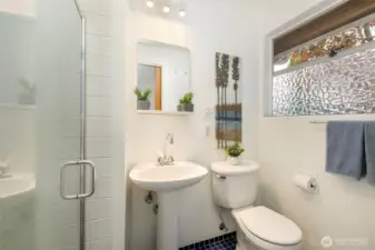 Primary bedroom three-quarter bathroom.