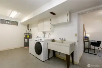 This Broadview home features a spacious laundry room with sink.