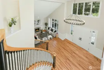 Light-filled interiors, soaring ceilings, and refined detailing, including crown molding, tray ceilings, custom millwork, and art alcoves.