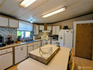 Newer appliances and lots of cabinet space and countertops