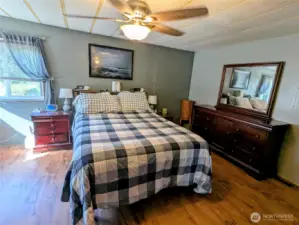 Primary bedroom with ceiling fan