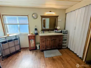 Primary bath vanity and closet