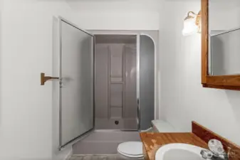 Downstairs living is complete with a full bathroom, perfectly positioned for the third bedroom, additional room, and spacious bonus area.