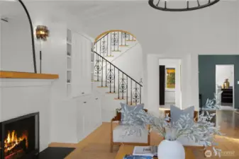The beautiful arched openings take you to the dining room and hallway where you can see the circular floorplan connects you to the kitchen from multiple directions.