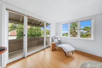 View of the Juliet balcony in the primary bedroom.  Such a lovely spot to enjoy a morning coffee or evening beverage. You can also catch views of the lake from this room!