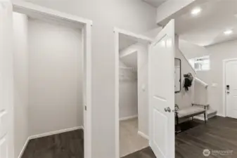 Lots of storage with deep coat closet and flexible storage room near entry. Actual home is under construction and finishes may vary. See site agent for details.