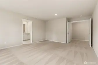 Primary bedroom with en-suite bathroom. Photos are representative only and may display different color package and/or upgrades.