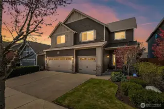 This gorgeous home is thoughtfully designed with stunning architectural accents and a delightful backyard!