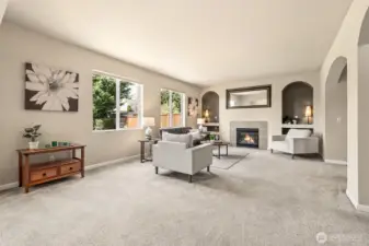 The natural daylight shines in through the large windows at the back of the house.