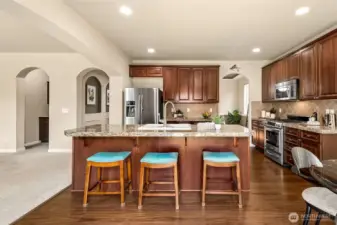 The center island with bar seating is so perfectly located