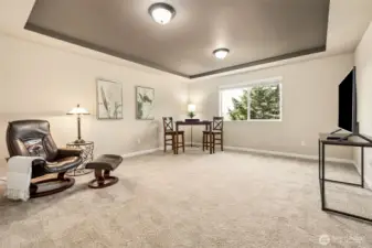 Expansive upstairs bonus room or 4th bedroom with coffered ceiling—perfect for a media room, office, or guest space.
