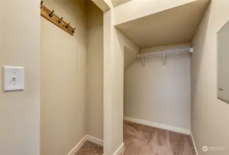 On your way upstairs, don't miss the extra deep storage closet right beneath the stairway.
