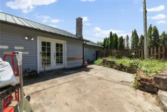 Back patio with french doors into living area