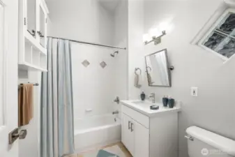 High ceiling full bath with skylight.