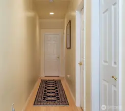 Main hallway to bedrooms, bath, storage room