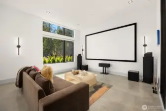 Photo of adjacent, completed home (lot 3) main floor media room - for representation purposes only.