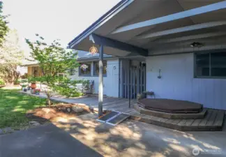 BACK YARD WITH COVERED HOT TUB