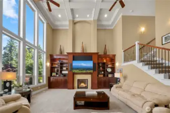 Exceptional family room w/built-ins, gas fireplace, acces to 2nd level. Custom details in ceiling, window design & decorating niches.