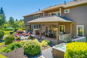Excellent entertaining area off the Great Room.  Built in BBQ area, gas fireplace, covered deck, hot tub...