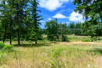 Surrounded by homes on spacious parcels, this area reflects pride of ownership and long-term stability. The large lot sizes help preserve privacy, reduce density, and contribute to the enduring value of the neighborhood. With no HOA it’s an ideal setting for those looking to build in a peaceful, established community with lasting appeal.