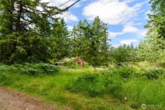 Perfect location for your custom home-nice, level building area at top of lot leading down a gentle slope to the lower half of the property which is also level.