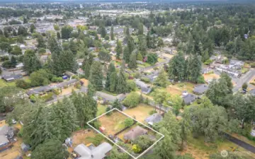 This is a shot of BOTH the vacant land lot AND the single family home for sale
