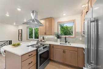 Hemlock soft close cabinetry with pull-outs for convenience.